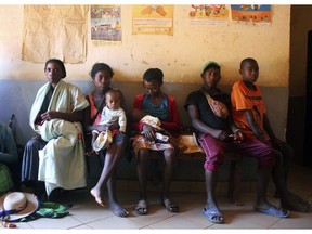 In this photo taken Thursday, March 21, 2019, mothers wait to have their babies vaccinated against measles, at a healthcare center in Larintsena, Madagascar. As the island nation faces its largest measles outbreak in history and cases soar well beyond 115,000, the problem is not centered on whether to vaccinate children. Many parents would like to do so but face immense challenges including the lack of resources and information.