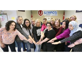 Eleven local RNs along with ONA executive members show their solidarity following "Get to know OUR 86 Public Health Nurses" event which was hosted by Windsor and District Labour Council on International Workers' Day at Unifor Local 444/200 Hall May 1, 2019.