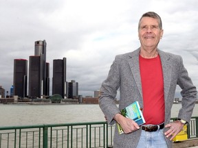 With the Detroit River and skyline as a backdrop, John Hartig poses visits Windsor's Dieppe Park Friday May 10, 2019.