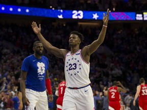 Philadelphia 76ers’ Jimmy Butler gestures to the crowd during last night’s big Game 6 win over the Raptors. (GETTY IMAGES)