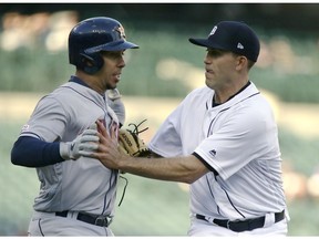 Pitcher Matthew Boyd #48 of the Detroit Tigers tags out Michael Brantley #23 of the Houston Astros on the first base line after fielding a grounder in the infield during the first inning at Comerica Park on May 13, 2019 in Detroit, Michigan.