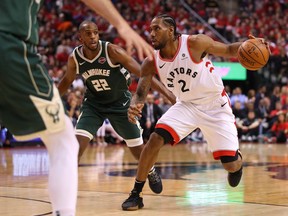 Kawhi Leonard #2 of the Toronto Raptors handles the ball during the second half against the Milwaukee Bucks in game four of the NBA Eastern Conference Finals at Scotiabank Arena on May 21, 2019 in Toronto, Canada.