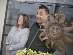 Theo and Jen Rallis, of Rallis Olive Oil, pose for a photo at a press event for Art in the Park at Devonshire Mall, Wednesday, May 22, 2019.