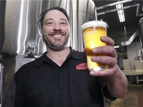 Cheers to the 519! Brad Wright, head brewer at Frank Brewing Co. in Tecumseh, is shown at the business on May 9, 2019. Frank's was one of 10 local breweries who combined their pale ales to create 519 Collab. It is the first Windsor-Essex craft beer blend and will be sold to raise money for local charities.