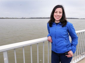 Charlotte Loaring is shown along the Detroit River in Windsor, ON. across from Belle Isle, MI. Loaring doesn't think the city of Windsor should be supporting the Detroit Grand Prix with a $50,000 grant each year. The race takes place on Belle Isle.