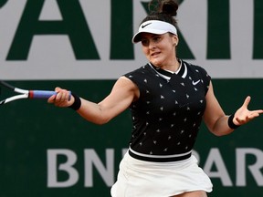 Canada's Bianca Andreescu plays a return to Czech's Marie Bouzkova during their women's singles first round match of the French Open in Paris on Monday, May 27, 2019.