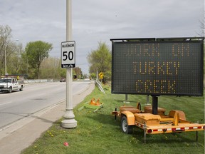 A construction sign informing motorists of the upcoming closure of Turkey Creek Bridge for repairs is pictured Wednesday, May 8, 2019.