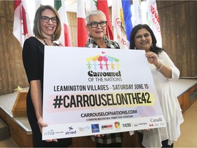 Hilda MacDonald, Mayor of Leamington, centre, poses with Allison Johnson, left, and Aruna Koushik, Carrousel of the Nations Co-Chairs during a press conference on Thursday, May 16, 2019, at the Caldwell First Nation Community centre. The event was held to announce the expansion of the Carrousel of the Nations into Leamington.