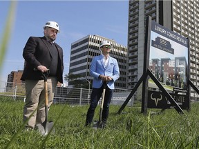 Windsor city councillor Rino Bortolin, left, and Peter Valente, president Valente Development Corporation are shown at a ground breaking ceremony on Wednesday, May 15, 2019, at 955 Ouellette Ave. The project will feature 32 modern luxury apartment condominiums and be completed in approximately one year.