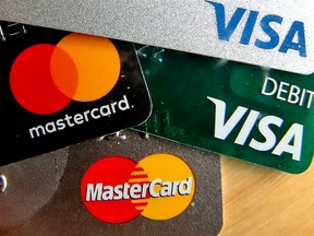 CMHC says debt levels rose as average balances for credit cards and lines of credit grew at a faster pace than in 2017, especially in Vancouver, Edmonton and Toronto.