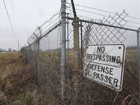A No Trespassing sign is shown on a fence around the Windsor Airport property near Lauzon Road and County Road 42 on Monday, December 3, 2018. Airport officials are concerned after a plane taking off from the airport on May 11 experienced a near-miss with a drone.