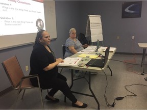 Carrie White, left, and Geri Robitaille present scenarios related to diabetic foot complications and testing participants on what each person should do in terms of foot care and seeking a professional.