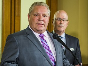 Ontario Premier Doug Ford and Minister of Municipal Affairs and Housing Steve Clark, address media outside of the Premier's office at Queen's Park in Toronto, Ont. on Monday May 27, 2019.