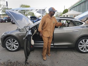 The EV Society Windsor Essex held a gathering on May 25, 2019, at the RET-Center in Windsor for electric vehicle enthusiasts. Eugene Jemison of Michigan is shown with his Tesla S 90 D during the event.