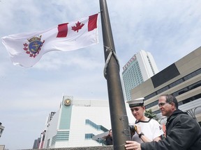 A flag raising to honour the RCSCC Agamemnon's 100th anniversary was held on Friday, May 17, 2019, at the Charles Clark Square. Sea cadet Andrew Bustamante, 15, and city employee Frank Tesolin raise the flag during the event.