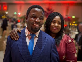 Charles Kayumbi and his wife, Marceline Kilongo, recipients of the Inspire Award at the Herb Gray Harmony Awards, pose for a photo before the award banquet at the Ciociaro Club, Thursday, May 2, 2019.