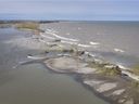 Strong winds have allowed a near-record high Lake Erie to break through the beach barrier at Hillman Marsh, causing lake water to rush into the Leamington marsh. The breach is shown in this May 8, 2019, aerial photo.