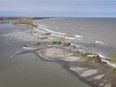 Strong winds have allowed a near-record high Lake Erie to break through the beach barrier at Hillman Marsh, causing lake water to rush into the Leamington marsh. The breach is shown in this May 8, 2019, aerial photo.