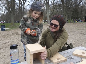 An outdoor celebration was held at the Holiday Beach Conservation Area in Amhertsburg on Saturday, May 4, 2019, for the Natural Pathways learning centre. The initiative received a grant from the Ontario Trillium Foundation. Odin Derbowka, 4, and his mom Marti Vardai teamed up to build a tree house during the event.