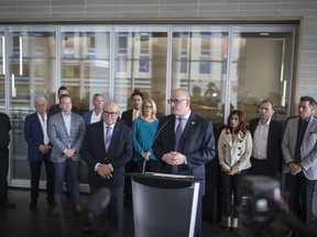 Mayor Drew Dilkens is joined by Essex County Warden, Gary McNamara, as well as members of the community who are in favour of the hospital being built on County Rd. 42, for a press conference at City Hall, Friday, May 17, 2019 to show the community support for the proposed location of the new mega-hospital on County Road 42..