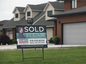 A "SOLD" sign is shown at a home in the 1300 block of Harvest Bend Rd. in South Windsor on Friday, May 24, 2019.