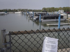 A sign informing boaters the docks at Lakeview Park Marina are closed for the season is seen due to high water levels, is seen, Friday, May 17, 2019.