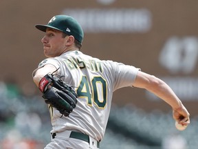 Oakland Athletics starting pitcher Chris Bassitt throws during the first inning of a baseball game against the Detroit Tigers, Thursday, May 16, 2019, in Detroit.
