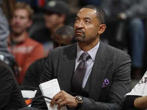 FILE - In this Nov. 30, 2016, file photo, Miami Heat assistant coach Juwan Howard watches during the second half of the team's NBA basketball game against the Denver Nuggets in Denver. A person with knowledge of the situation tells The Associated Press that Howard has agreed to a five-year deal to take over as Michigan men's basketball coach. The person spoke on condition of anonymity Wednesday, May 22, 2019, because the announcement had not been made.