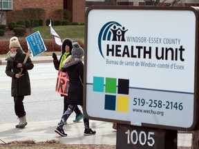 The sign at the offices of the Windsor-Essex County Health Unit on Ouellette Avenue while striking nurses picketed on April 11, 2019.
