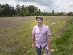 Ward 9 Councillor, Kieran McKenzie, is pictured in the neighbourhood of Walker Estates where a pedestrian and cyclist pathway will be built that crosses the 6th Concession on May 28, 2019.