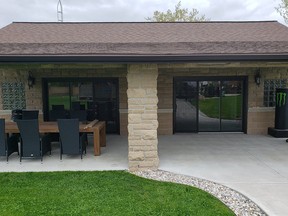 Great Lakes Windows & Doors installed patio doors as a replacement option to garage doors in this customer's pool house.