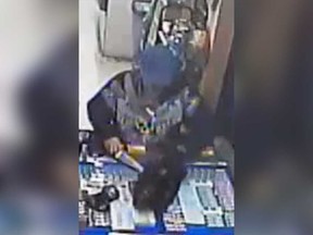 A security camera image of a robber who brandished a knife at the Circle K store at 4675 Seminole St. on May 15, 2019.