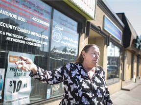 Christine Wilson-Furlonger, the administrator of Street Help, points out the businesses surrounding the homeless shelter, Monday, May 27, 2019, in response to comments by Larry Horwitz.