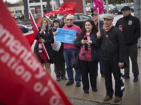 Approximately  20 teachers held a rally protesting the provincial government's cuts to education at Jackson Park, Wednesday, May 1, 2019.