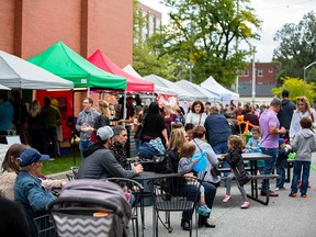 Tables and vendor tents on Argyle Road by the Walkerville Brewery during the Buskerville Festival in August 2018. The site will be used for the new Walkerville Distillery District Night Market on the last Friday of May, June, July, and August 2019.