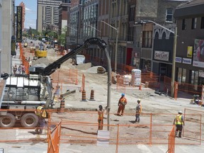 Crews work on the transformation of Dundas Street into a flex street in London. One in 10 employers in the area intends to hire in the third quarter of 2019, although construction job growth is expected to be a stronger. (Derek Ruttan/The London Free Press)