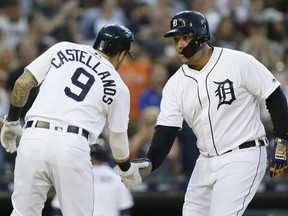 Miguel Cabrera #24 of the Detroit Tigers celebrates with Nicholas Castellanos #9 after hitting a grand slam against the Tampa Bay Rays during the fifth inning at Comerica Park on June 4, 2019 in Detroit, Michigan.
