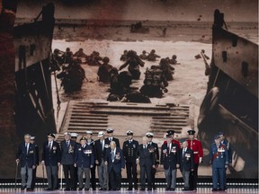 Veterans stand on stage during the D-Day Commemorations on June 5, 2019 in Portsmouth, England. The political heads of 16 countries involved in World War II joined Her Majesty, The Queen on the UK south coast for a service to commemorate the 75th anniversary of D-Day. Overnight it was announced that all 16 had signed a historic proclamation of peace to ensure the horrors of the Second World War are never repeated. The text has been agreed by Australia, Belgium, Canada, Czech Republic, Denmark, France, Germany, Greece, Luxembourg, Netherlands, Norway, New Zealand, Poland, Slovakia, the United Kingdom and the United States of America.