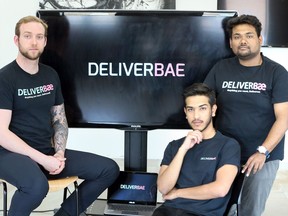 Deliverbae is set to launch its local home delivery enterprise on Monday. The team of Matt Deleersnyder, left, Miraj Hossain and A.K.M. Mehedi Hassan, right, are pictured at the Business Accelerator on Howard Avenue.