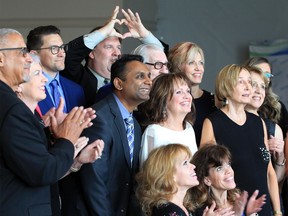 Carol Derbyshire, centre, and Chamber CEO Rakesh Naidu, centre left, are surrounded by Chamber 143 guests as Derbyshire prepares to receive the 2019 Lifetime Achievement Award by Windsor-Essex Regional Chamber of Commerce in the St. Clair College Alumni Skyline Room at St. Clair Centre for the Arts Wednesday.