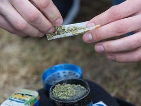 Cannabis being prepared for use at a pro-marijuana rally on Parliament Hill in Ottawa on April 20, 2019.