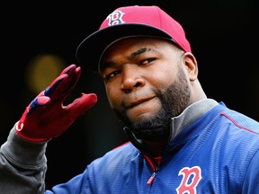 David Ortiz of the Boston Red Sox enters the dugout after batting practice before the Red Sox home opener against the Baltimore Orioles at Fenway Park on April 11, 2016 in Boston, Massachusetts.