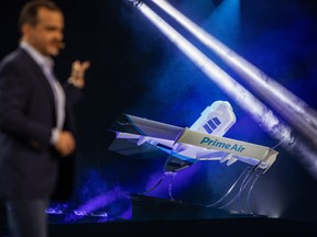 Jeff Wilke, chief executive officer of worldwide consumer at Amazon.com Inc., speaks next to a Prime Air delivery drone during a reveal event in Las Vegas, Nevada, U.S., on Wednesday, June 5, 2019.