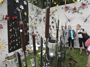 People check out a display at the Art in the Park at the Willistead Manor in Windsor on Saturday, June 1, 2019.