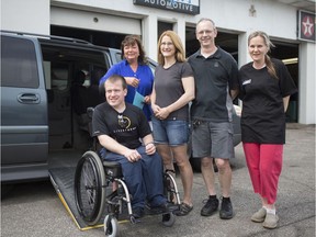 Lynn Calder, centre-left, executive director of Assisted Living Southwestern Ontario, is joined by the Wuerch family, Nathan, left, and Shirley and Richard, centre, as well as Mel Hibbert, owner of Mel's Auto Garage, after the Wuerch family donated their 2014 Pontiac Montana to Assisted Living, Tuesday, June 4, 2019.