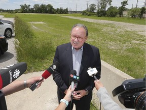 Fulvio Valentinis, Windsor Essex Catholic District School board chair speaks to reporters at a parcel of land in the 2400 block of McDougall Ave. on Friday, June 14, 2019 that will be the new location of the Catholic Central High School.