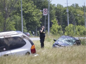 OPP investigate a head-on collision on Highway 3 in front of Country Meadows Cemetery between Victoria Ave. and Maidstone Ave. that sent two people to hospital with serious injuries, Friday, June 21, 2019.  The male driver of the second vehicle fled on foot.