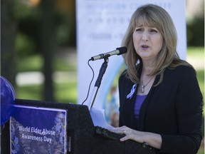 Barb Iacono, community programs manager for Family Services Windsor-Essex, speaks during a flag raising event for World Elder Abuse Awareness Day at Charles Clark Square, Friday, June 14, 2019.