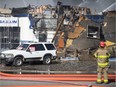 WINDSOR, ONT:. JUNE 23, 2019 - Fire crews work to put out a large commercial fire at Serbu Tire on Howard Ave., at Hanna St. E, Saturday, June 23, 2019.