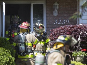 WINDSOR, ONT:. JUNE 3, 2019 - Fire crews respond to a house fire at 3239 Candlewood Cres. in Devonshire Heights, Monday, June 3, 2019.  All occupants exited safely and no injuries were reported.  Fire officials on scene said there is damage at the rear of the house.